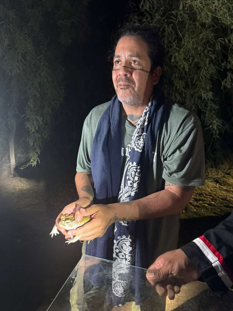 Holding Bufo (Otac) in ceremony