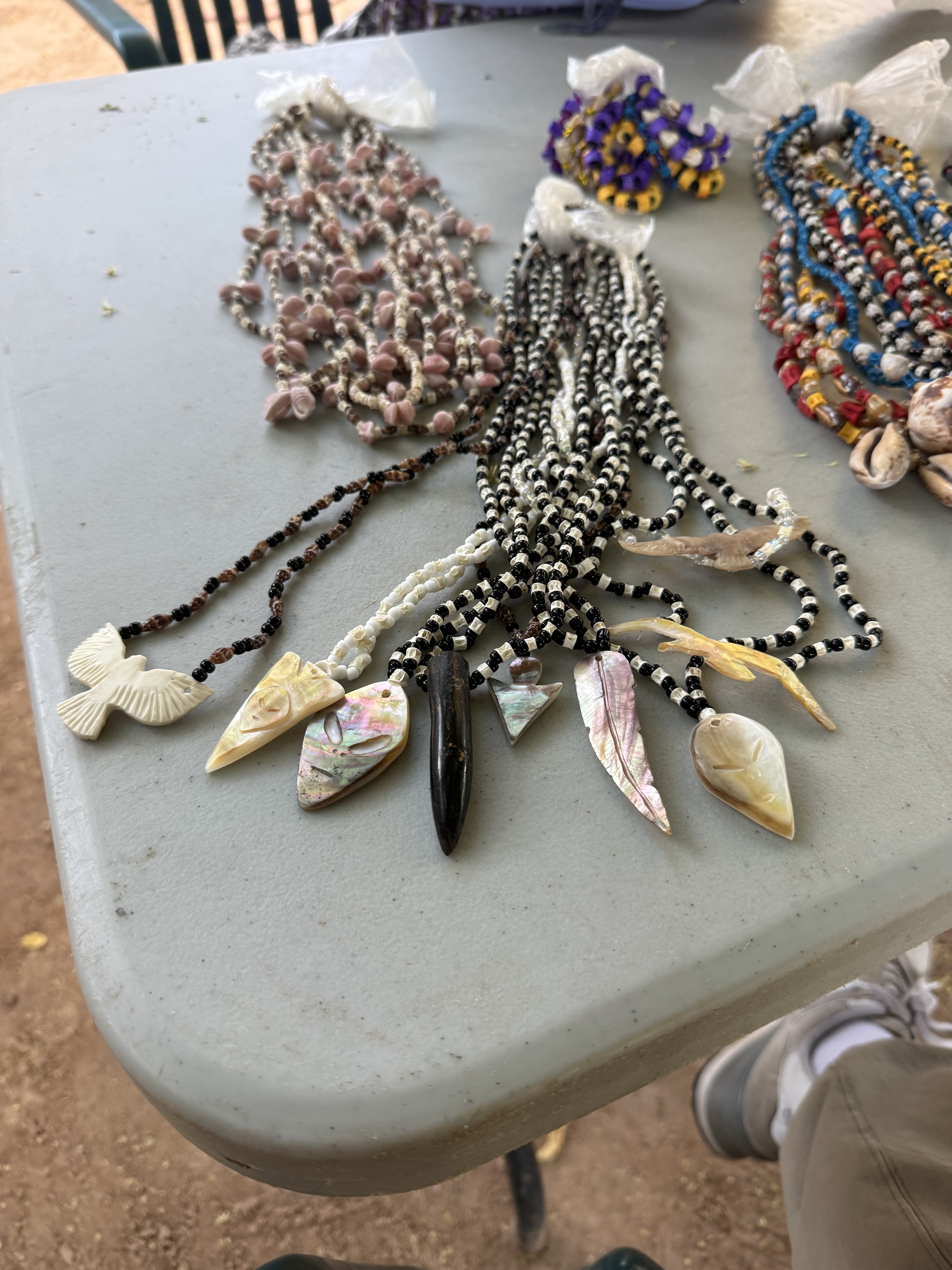 Shell and bead ceremonial necklaces and tools