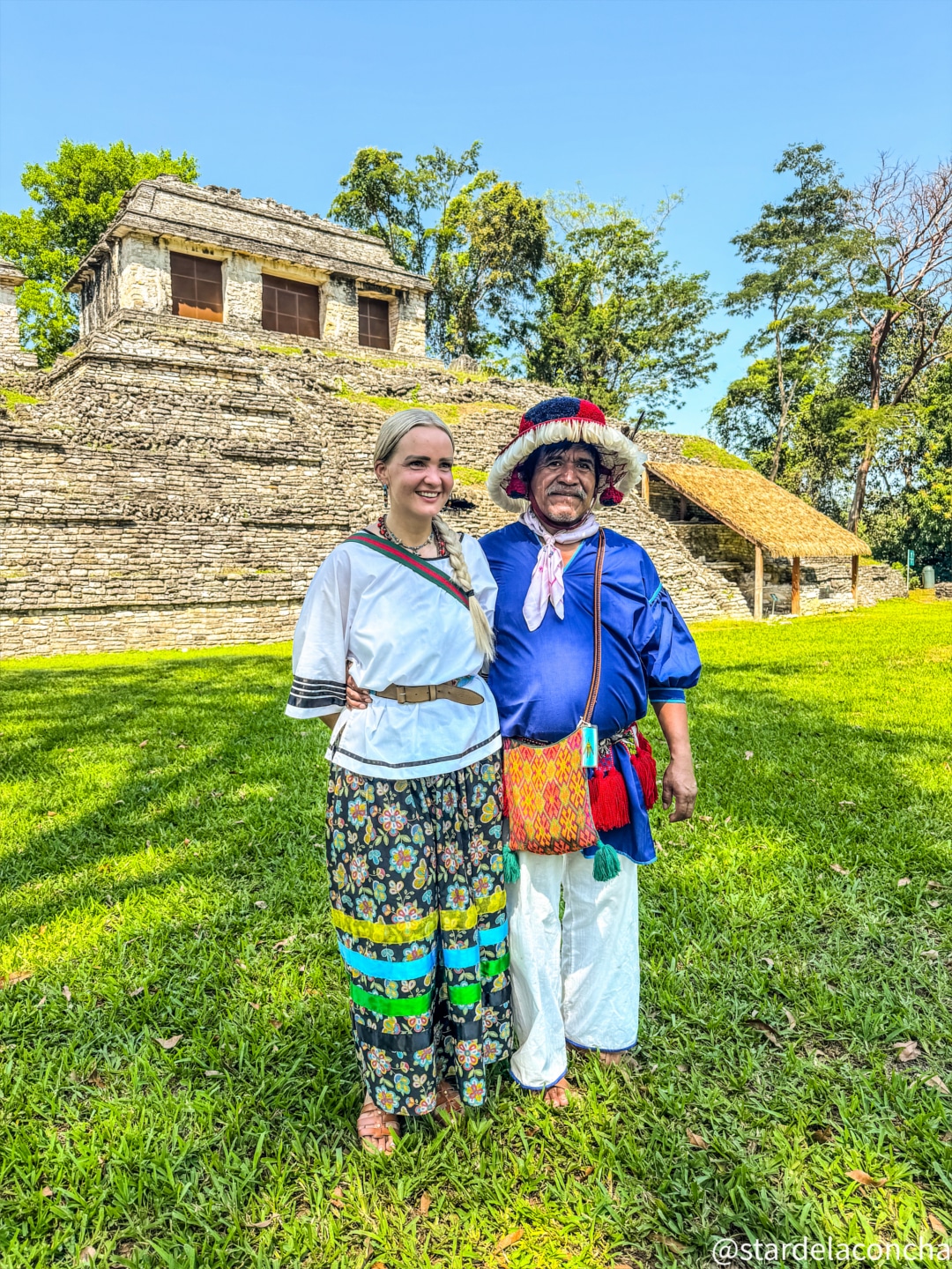 In traditional dress at a sacred site