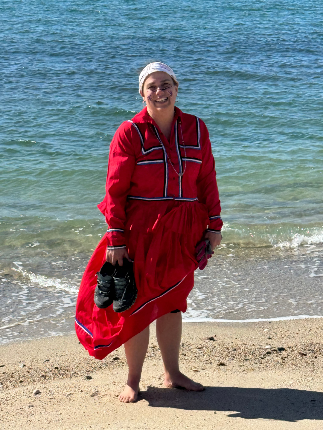 By the Sea of Cortez in ceremonial red